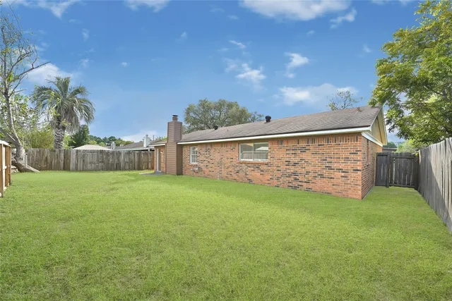 a view of a backyard with a garden