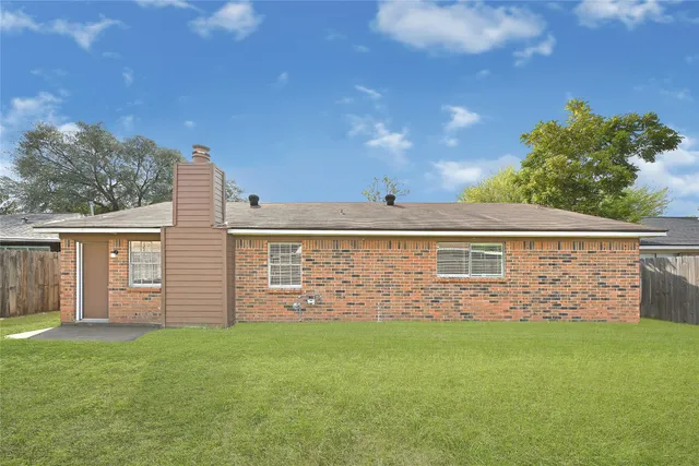 front view of house with a yard