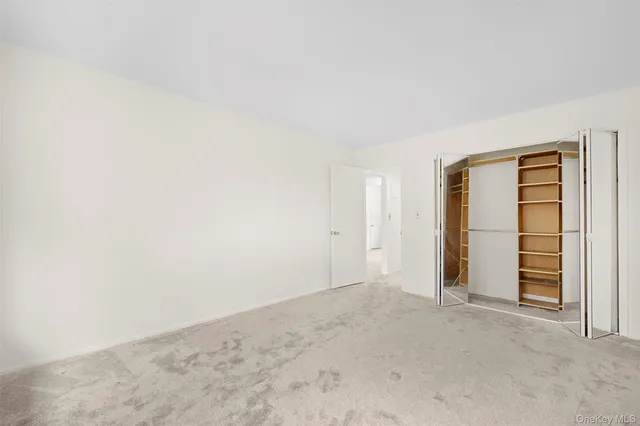 an empty room with closet