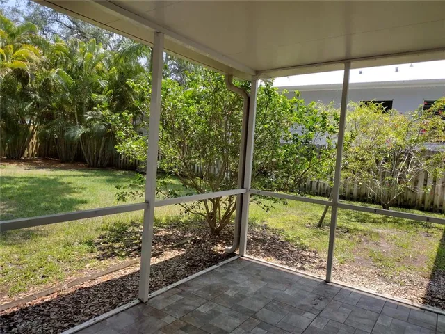 a view of a backyard with plants