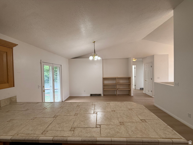 838 East Mountain Road Logan, UT 84321 - Photo 13 of 37 Vaulted ceilings complement the open-concept design