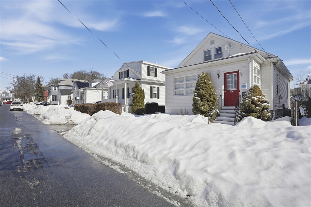 55 Addison Avenue Lynn, MA 01902 - Photo 2 of 23 a view of a house with a snow in the background