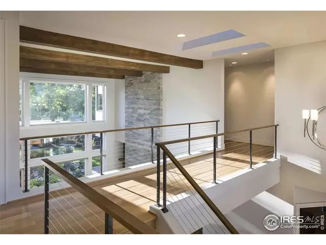 a view of balcony with furniture