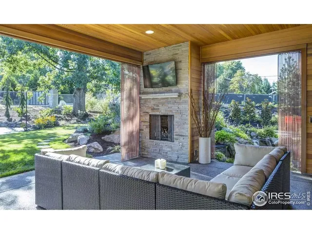 a outdoor living space with furniture and garden view