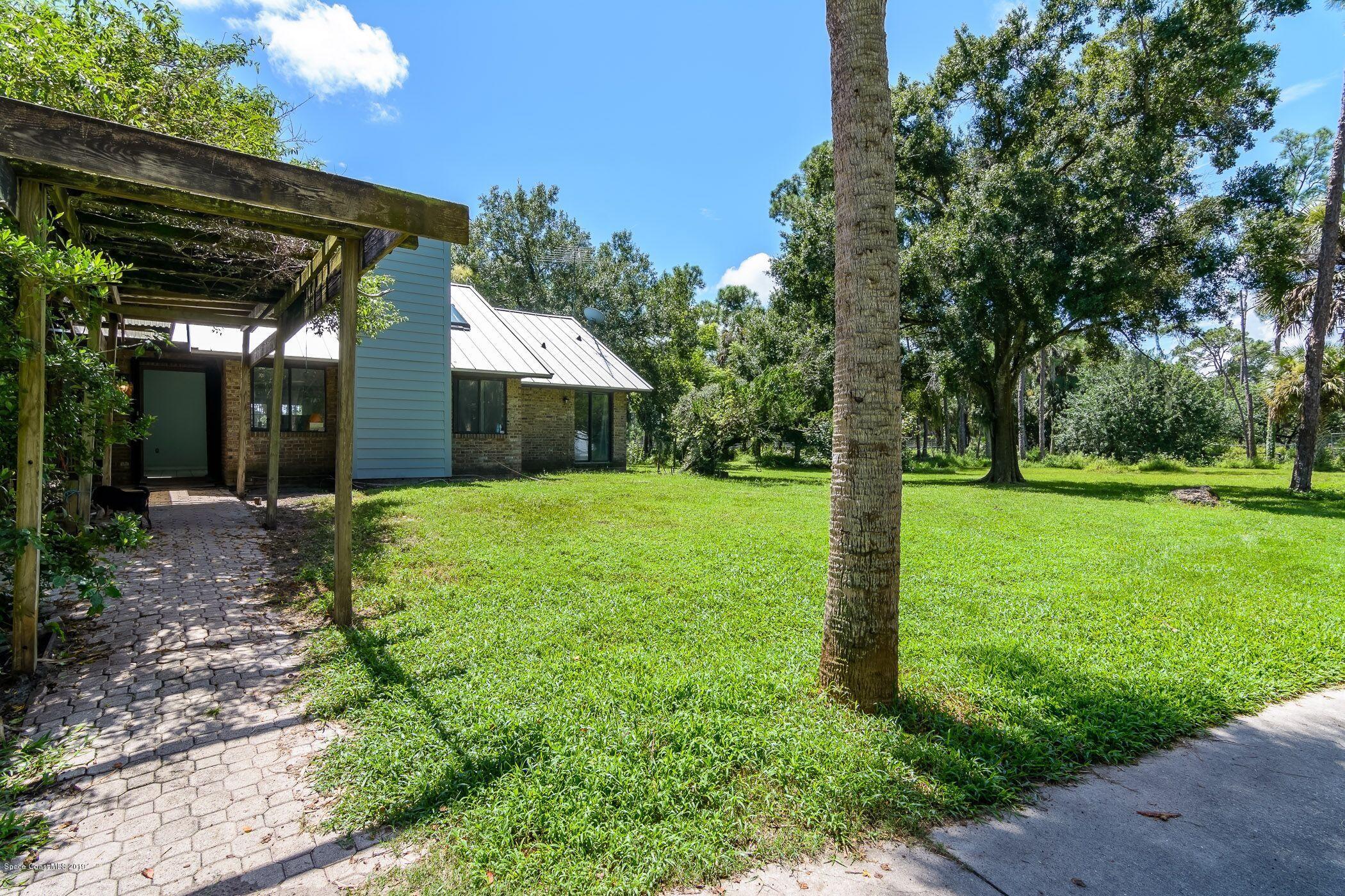 4065 Corey Road Grant Valkaria, FL 32950 - Photo 22 of 31 Front door