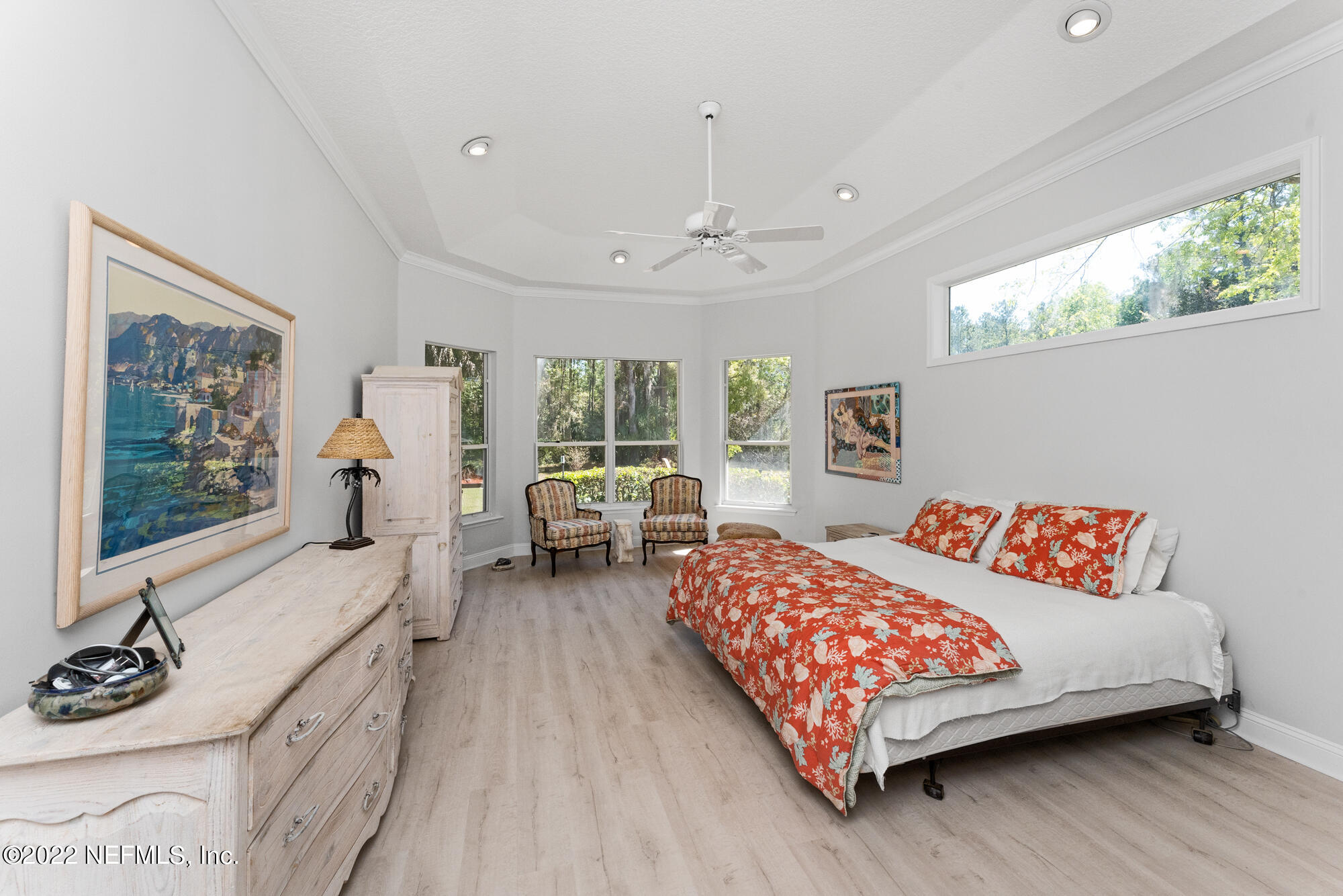 740 Mill Stream Road Ponte Vedra Beach, FL 32082 - Photo 14 of 37 a bedroom with a bed couch and three large window