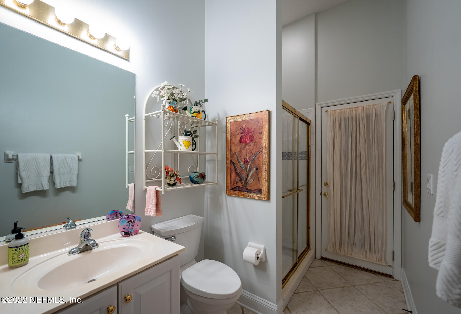 740 Mill Stream Road Ponte Vedra Beach, FL 32082 - Photo 16 of 37 a bathroom with a sink toilet and shower