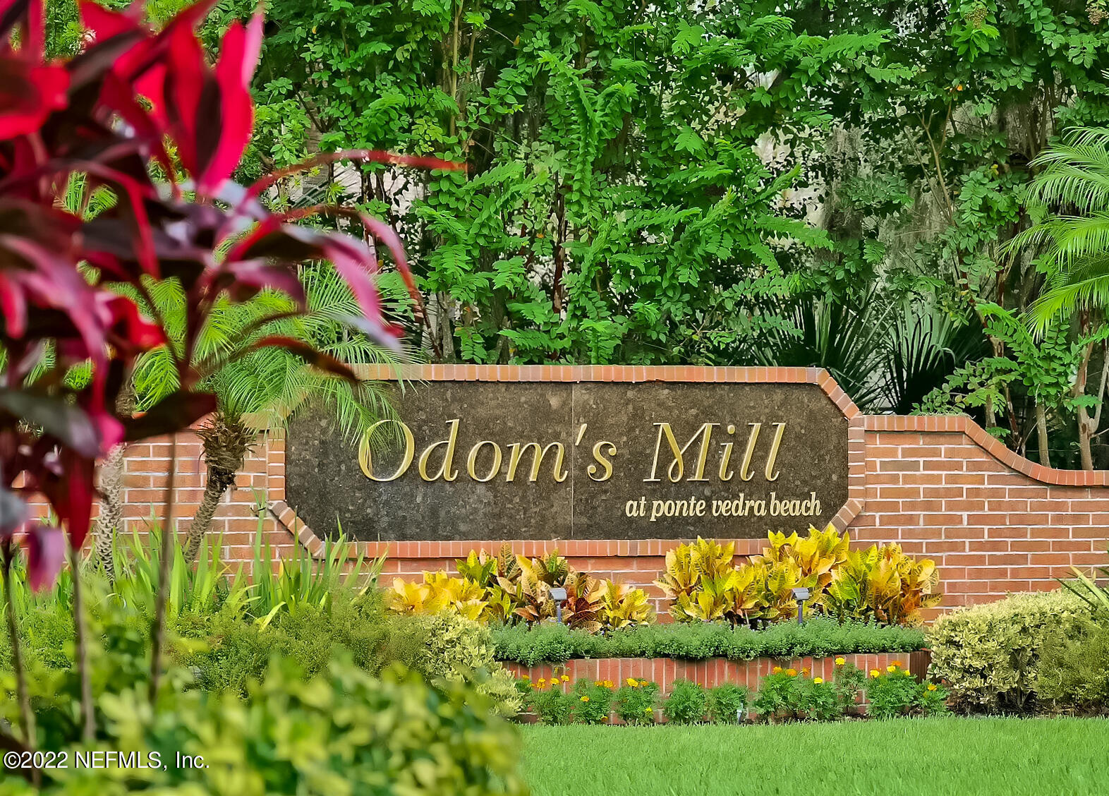 740 Mill Stream Road Ponte Vedra Beach, FL 32082 - Photo 37 of 37 a sign broad in front of flowers