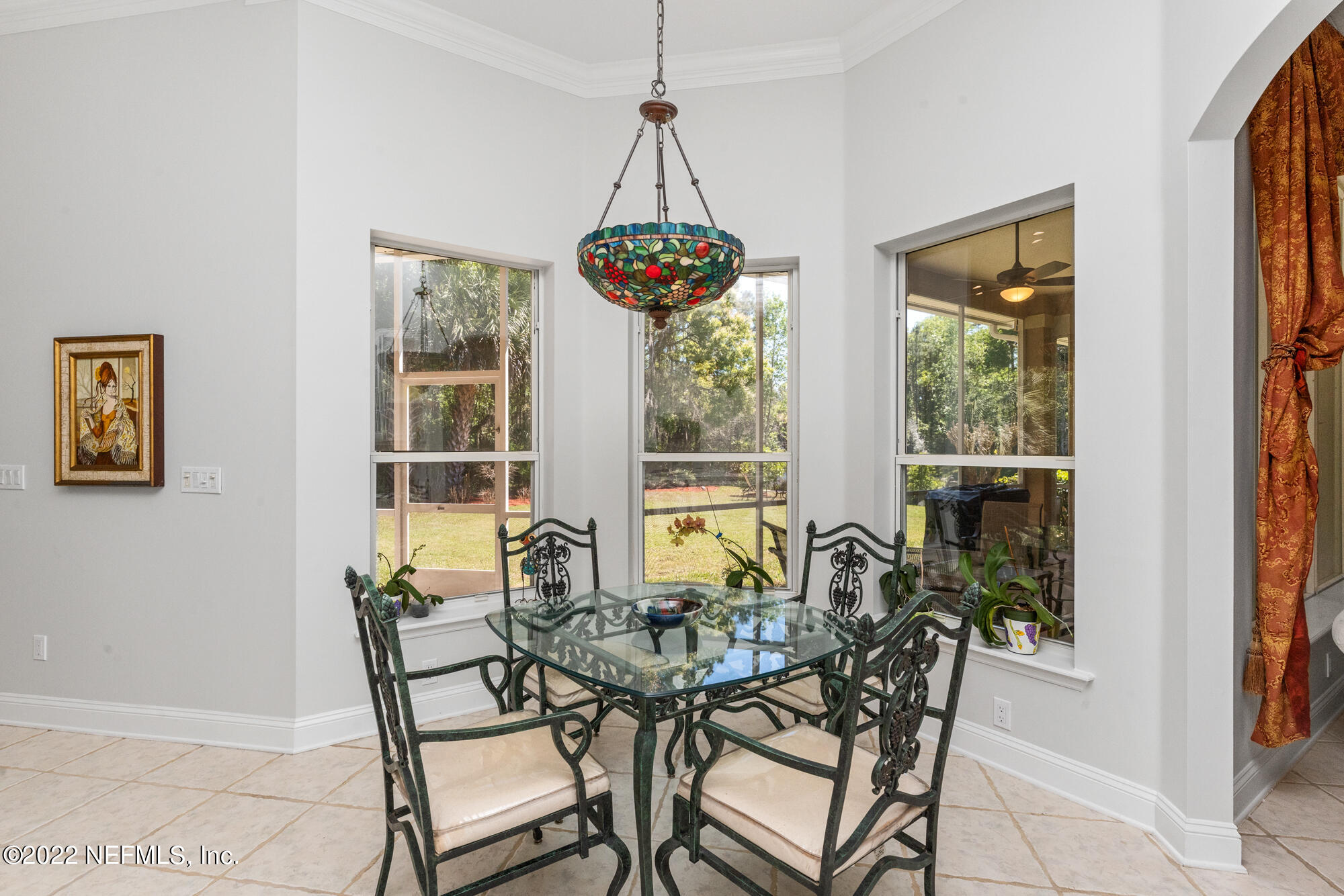 740 Mill Stream Road Ponte Vedra Beach, FL 32082 - Photo 10 of 37 a dining room with furniture and window
