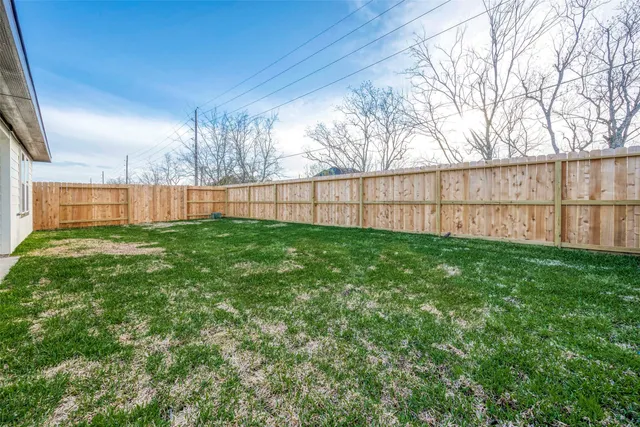 a view of a backyard with a garden