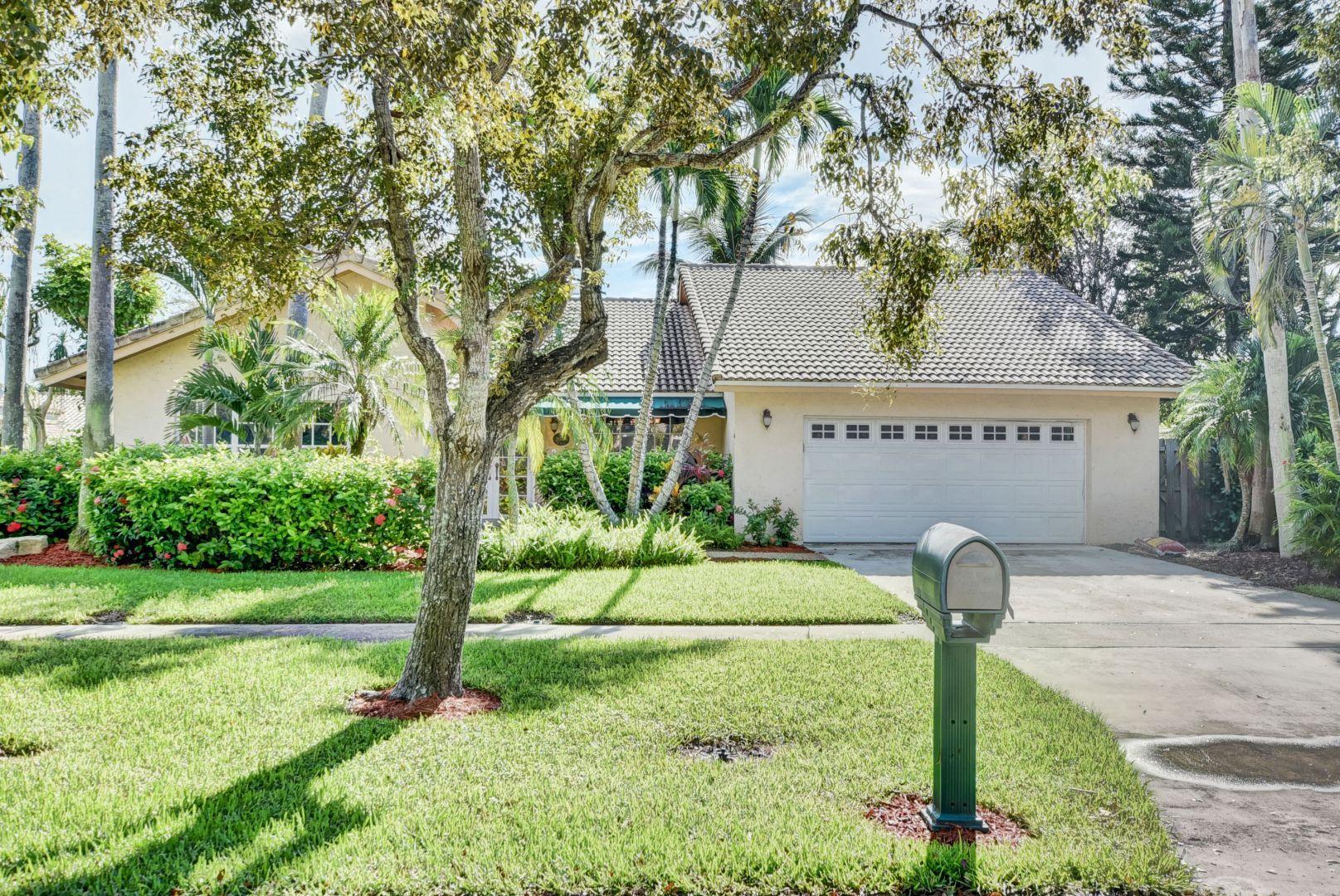 2068 Southwest 8th Avenue Boca Raton, FL 33486 - Photo 1 of 35 a view of a park with large tree