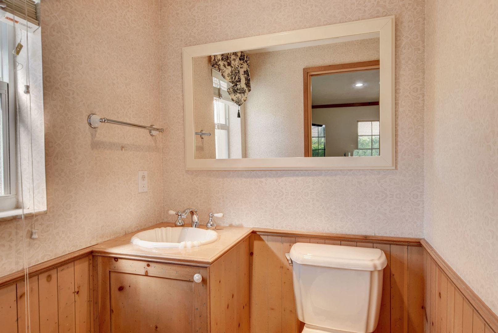2068 Southwest 8th Avenue Boca Raton, FL 33486 - Photo 14 of 35 a utility room with a sink a washer and dryer