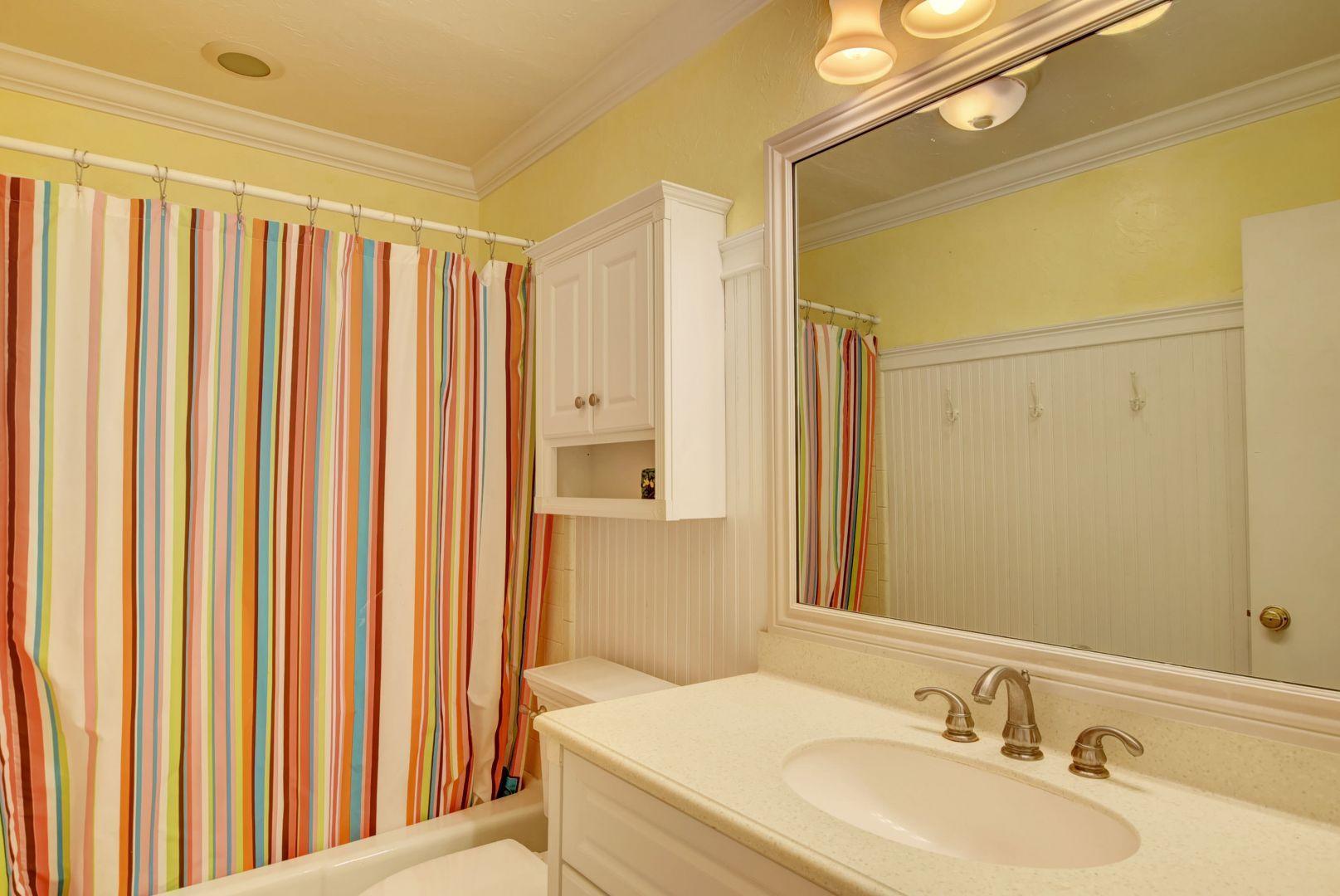 2068 Southwest 8th Avenue Boca Raton, FL 33486 - Photo 21 of 35 a bathroom with a sink and a mirror