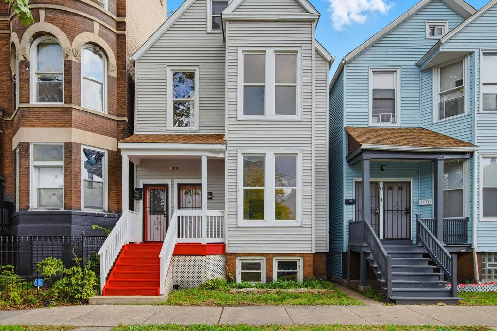 8919 South Exchange Avenue Chicago, IL 60617 - Photo 3 of 41 a front view of multiple houses