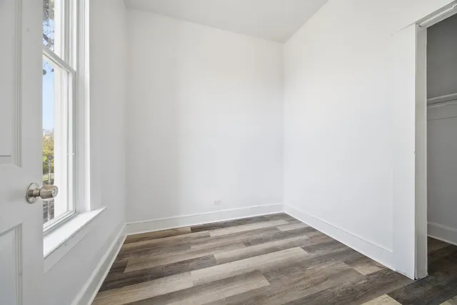 a view of a room that has a window