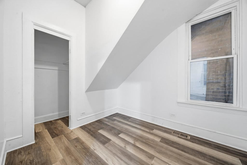 8919 South Exchange Avenue Chicago, IL 60617 - Photo 36 of 41 a view of a room that has a window