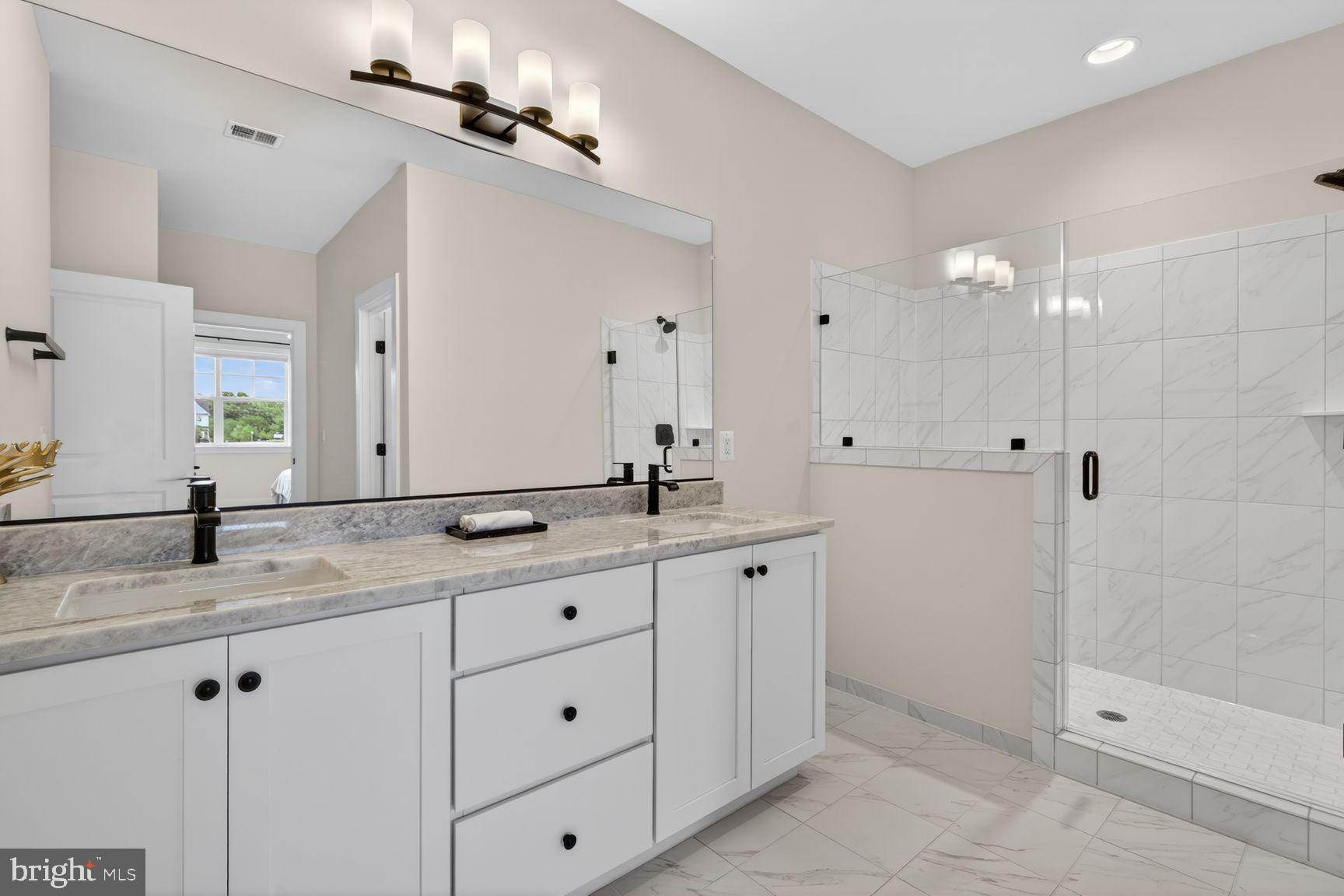 6213 Mcconnell Lane Springfield, VA 22152 - Photo 25 of 39 a bathroom with a granite countertop sink mirror and double
