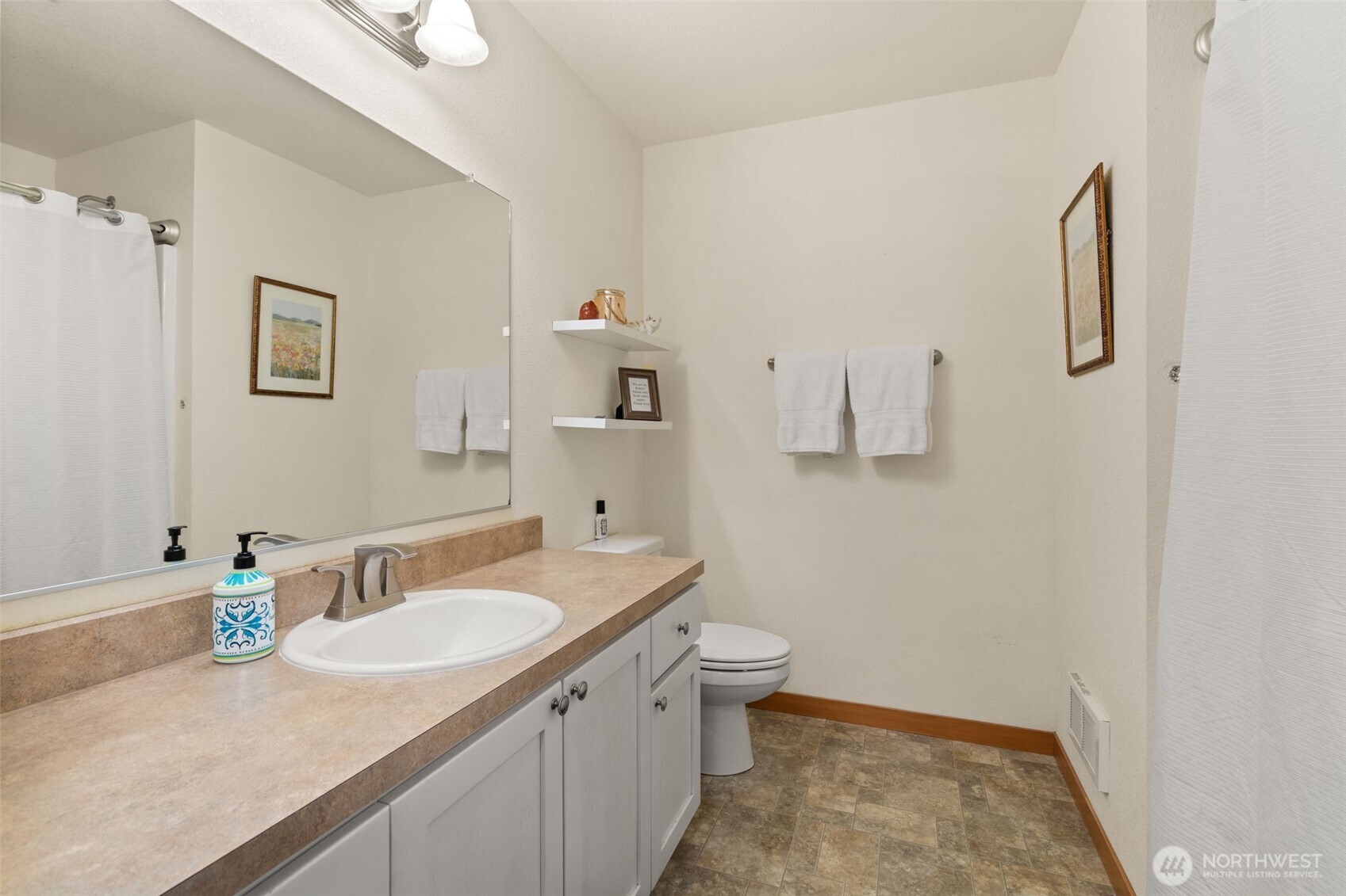 236 Chilvers Road Chehalis, WA 98532 - Photo 15 of 39 a bathroom with a sink toilet and vanity