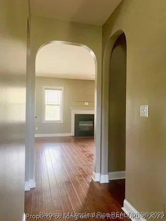 a view of entryway with wooden floor