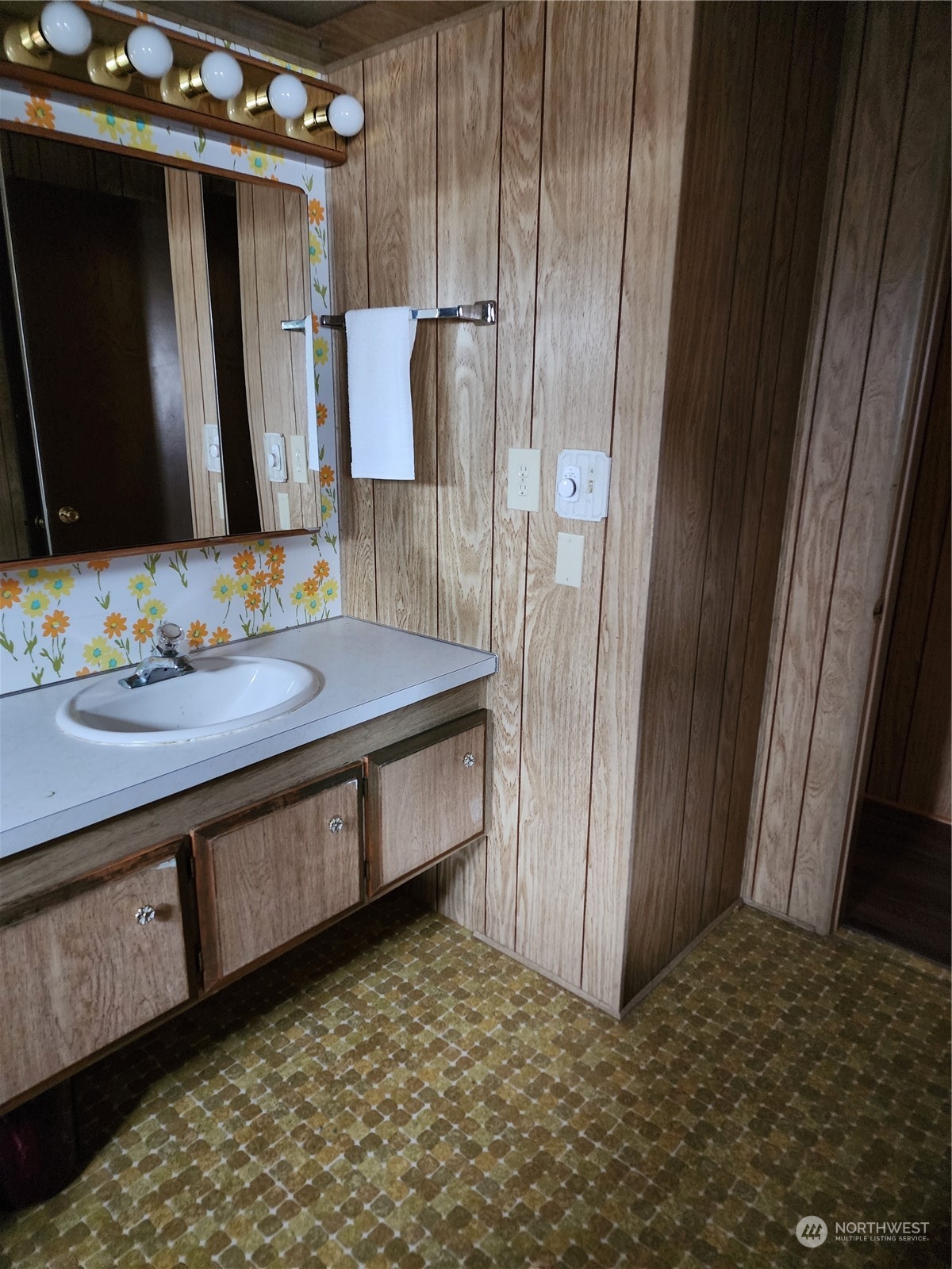 491 Mill Road, Unit 36 Sequim, WA 98382 - Photo 15 of 21 a bathroom with a sink and a mirror