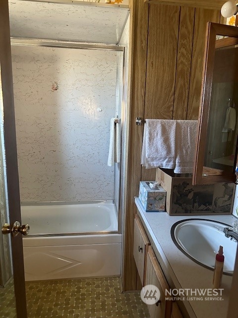 491 Mill Road, Unit 36 Sequim, WA 98382 - Photo 17 of 21 a bathroom with a granite countertop sink and a mirror