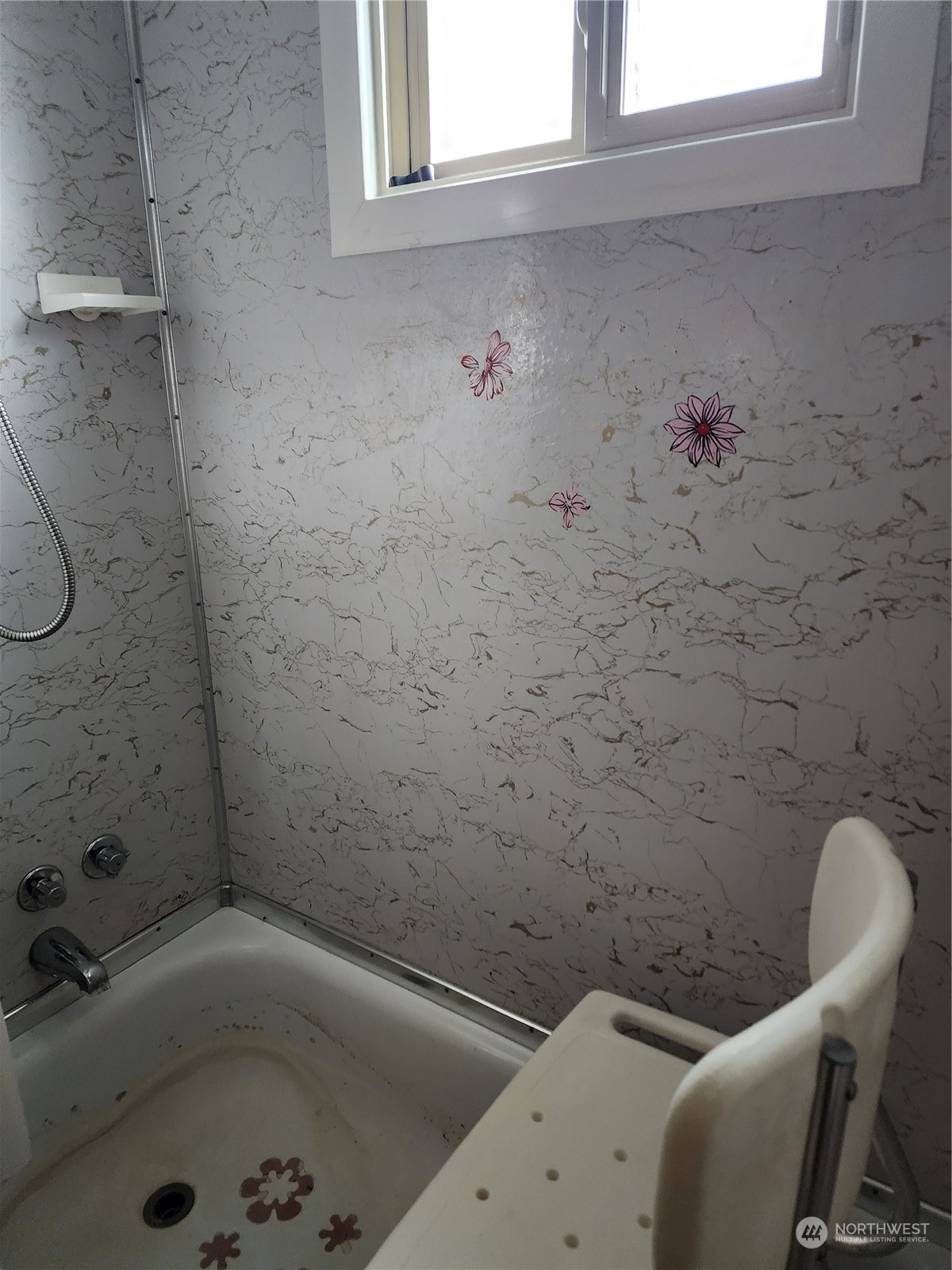 491 Mill Road, Unit 36 Sequim, WA 98382 - Photo 18 of 21 a bathroom with a bathtub and window