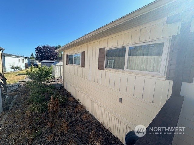 491 Mill Road, Unit 36 Sequim, WA 98382 - Photo 4 of 21 a porch with seating space