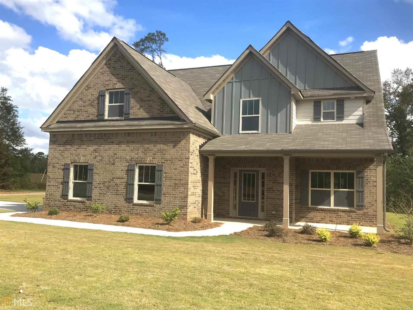 4000 Bibb Ridge Trail, Unit 183 Locust Grove, GA 30248 - Photo 1 of 1 a front view of a house with a yard