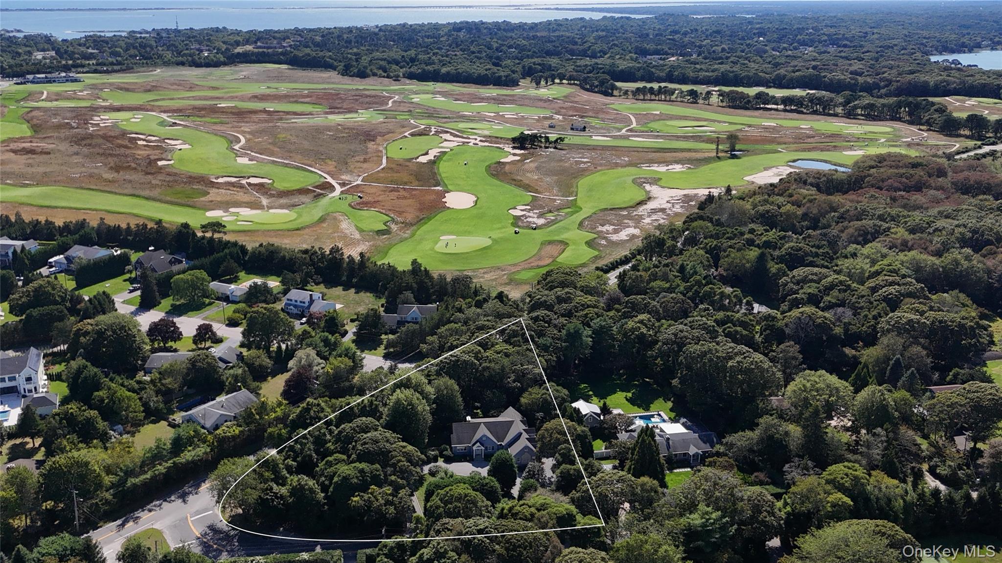 71 Sebonac Inlet Road Southampton, NY 11968 - Photo 5 of 6 Aerial view of property's location with nearby suburban area and property parcel outlined