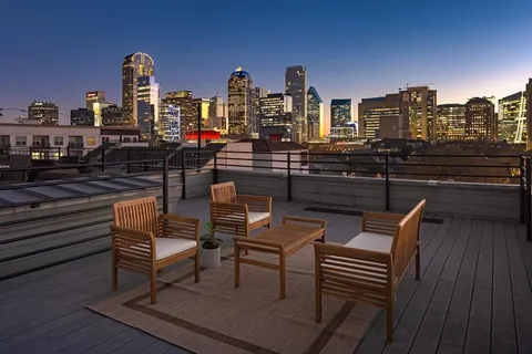 a view of a terrace with seating area