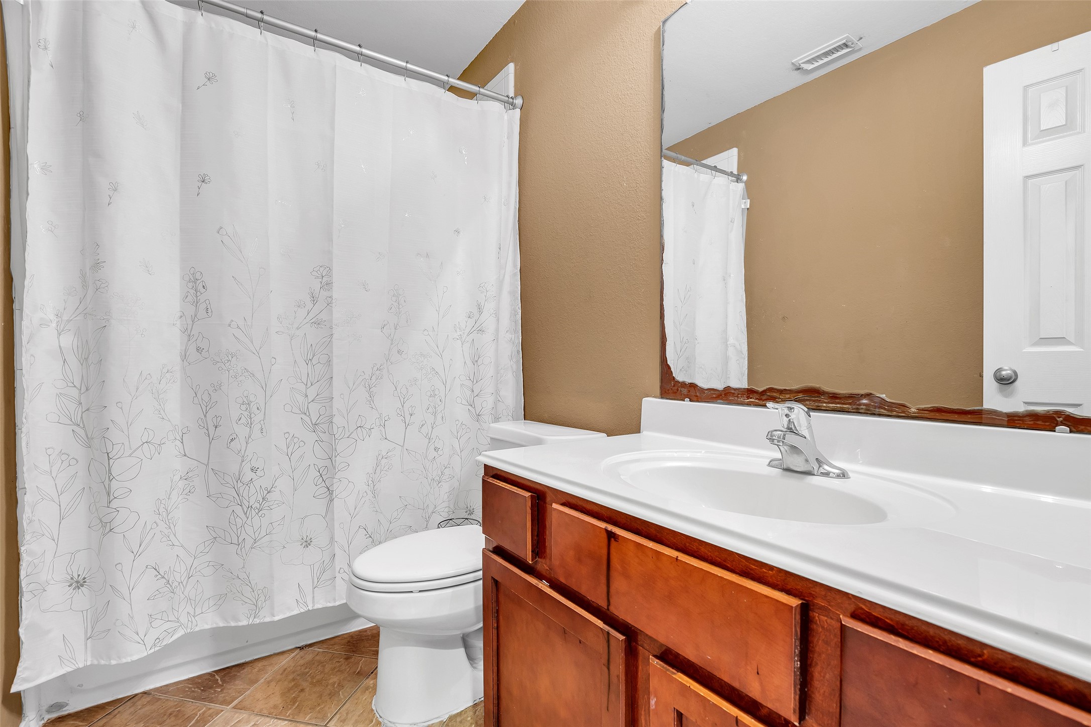 611 River Delta Lane Rosenberg, TX 77469 - Photo 31 of 39 a bathroom with a sink a toilet and shower