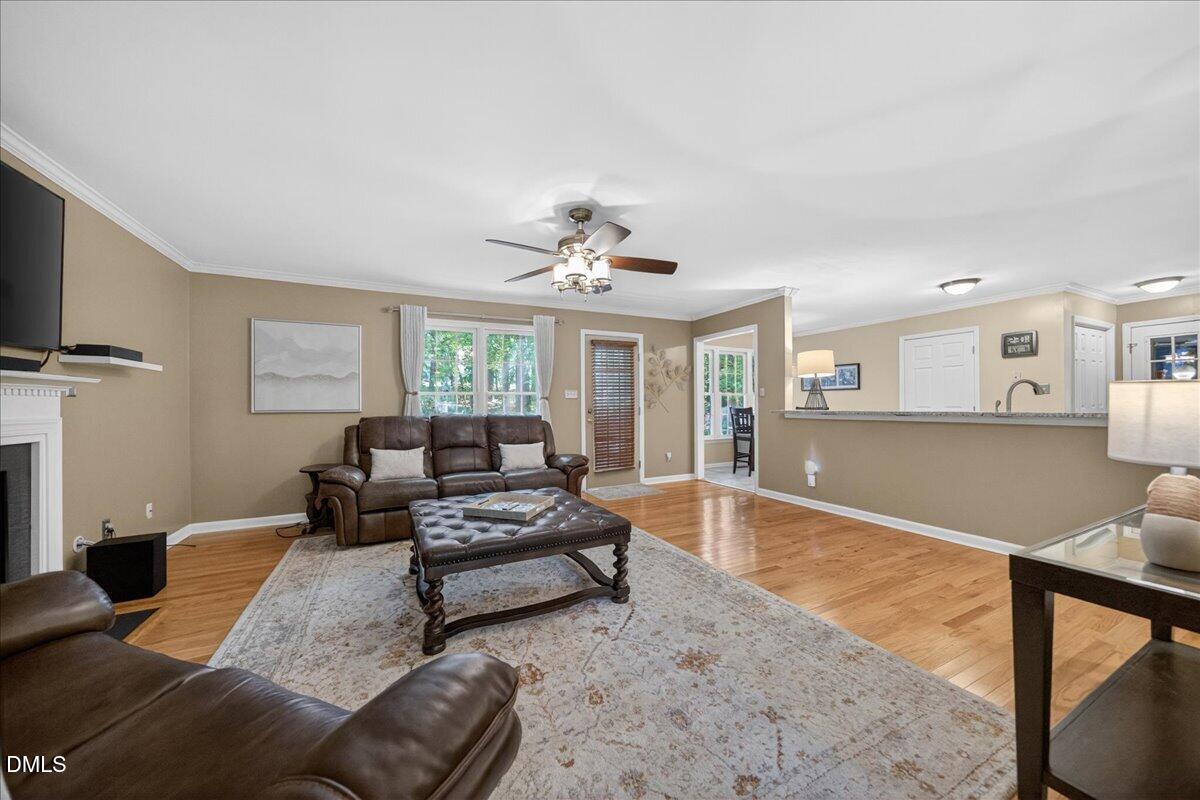 9536 Bells Valley Drive Raleigh, NC 27617 - Photo 11 of 39 a living room with furniture and a large window