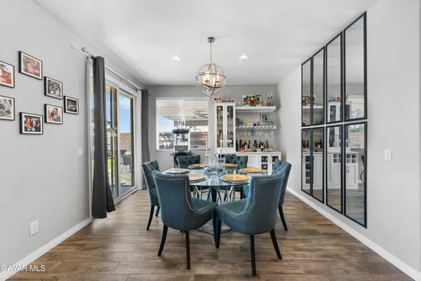 a kitchen with stainless steel appliances granite countertop a stove and a sink