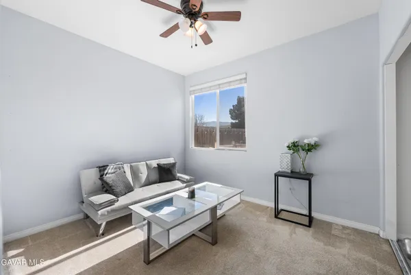 a view of a swimming pool with a lounge chairs