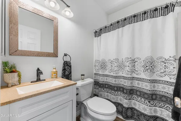 a view of a house with swimming pool and porch