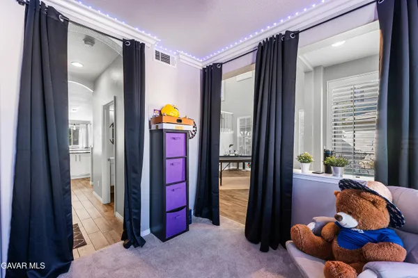 a view of a house with swimming pool yard and patio