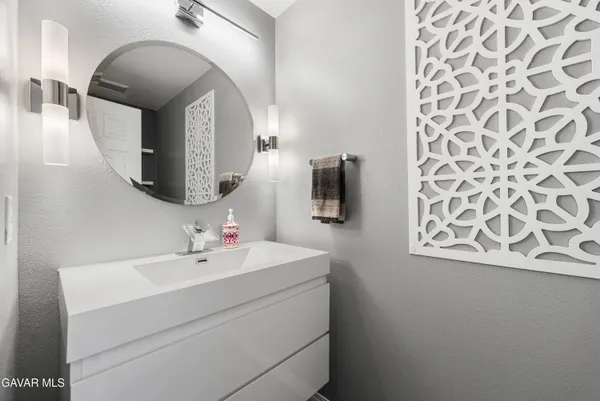 an aerial view of a house with a swimming pool