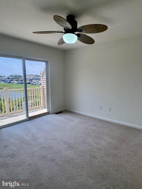 26497 Thunder Road Millsboro, DE 19966 - Photo 21 of 30 Bright room with scenic balcony view.