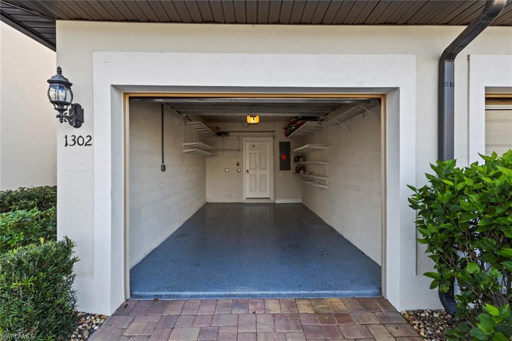 5701 Mayflower Way, Unit 1302 Ave Maria, FL 34142 - Photo 28 of 32 a view of a hallway