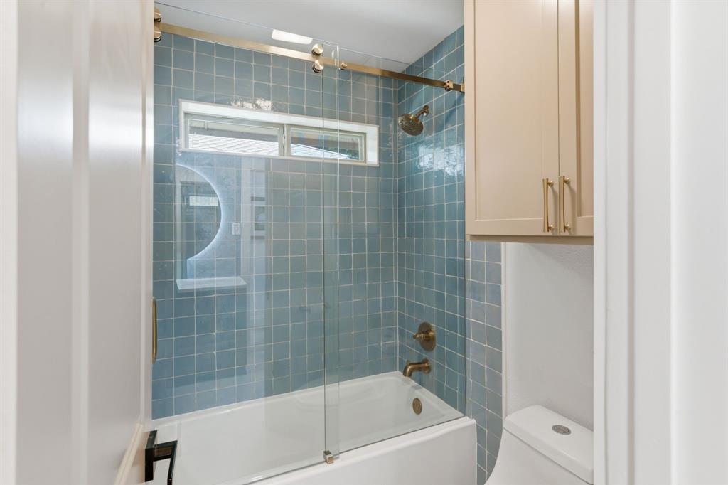 2319 Castle Rock Road Carrollton, TX 75007 - Photo 12 of 30 Renovated bath/shower