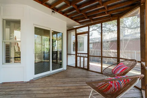 a view of a balcony with couch