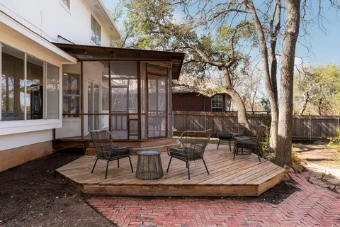 a view of sitting area in front of house
