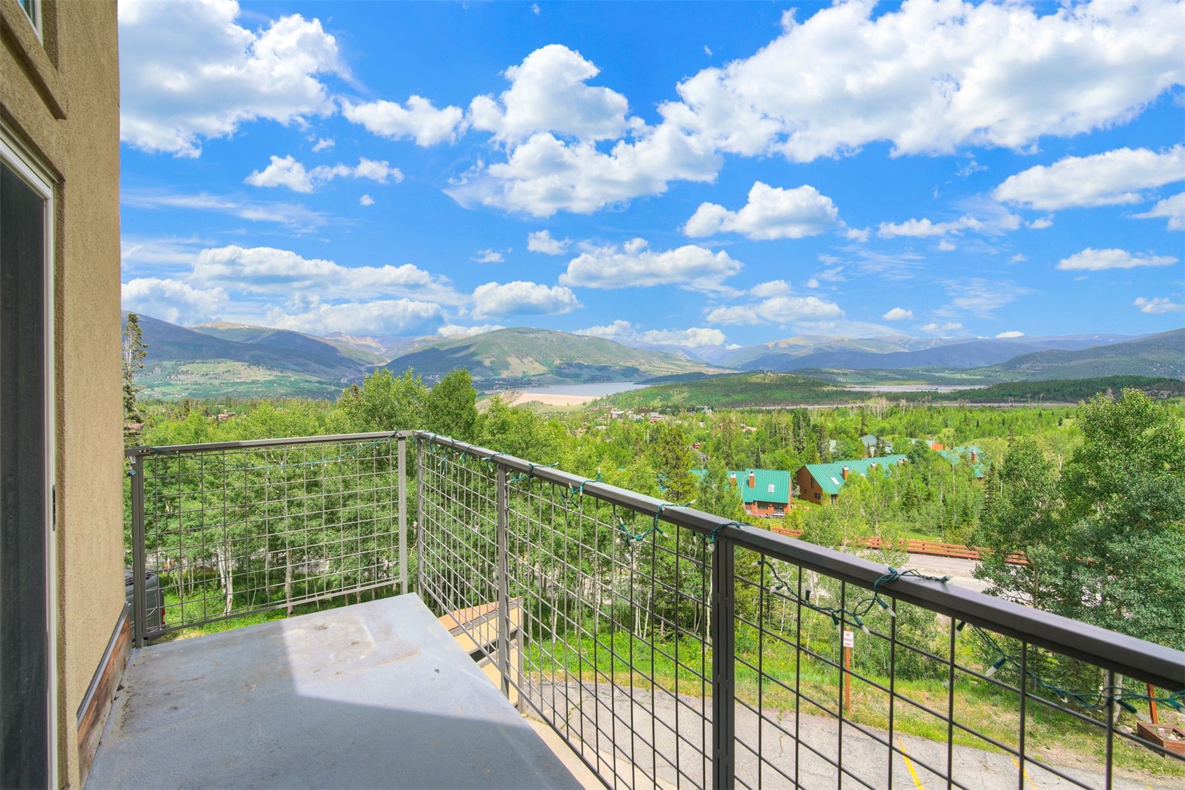 7031 Ryan Gulch Road, Unit 301 Silverthorne, CO 80498 - Photo 5 of 37 a view of a city from a balcony