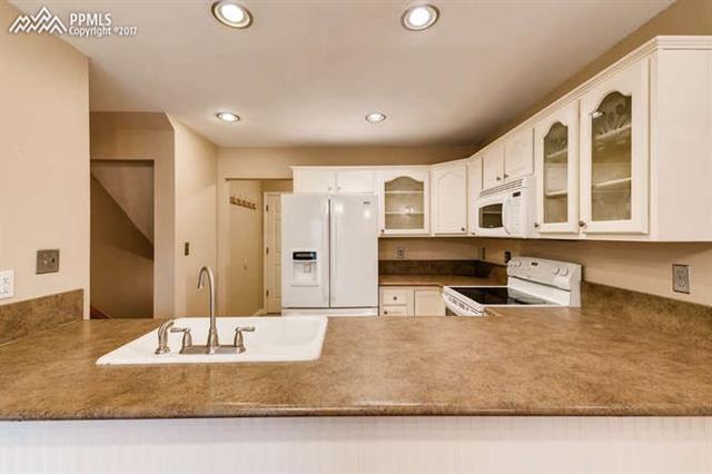 67 Rising Sun Terrace Colorado Springs, CO 80921 - Photo 6 of 26 Ample counter space