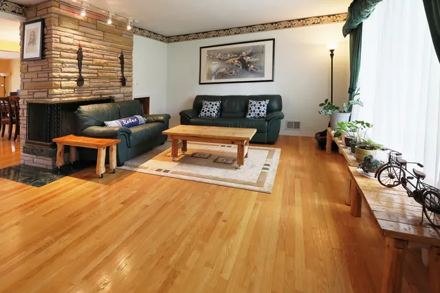 a living room with furniture and a table