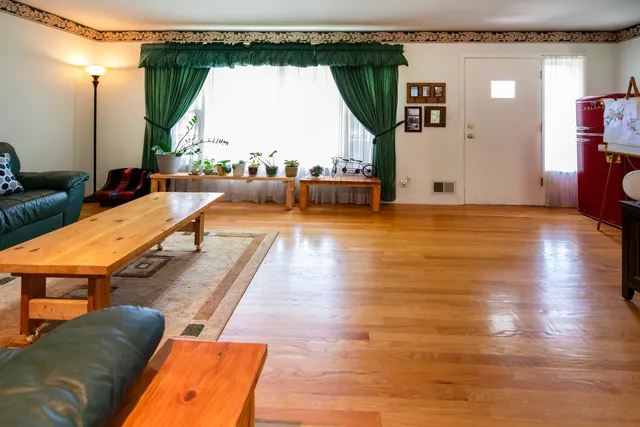 a view of a living room and dining room