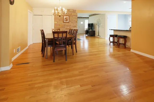 a view of a dining room with furniture