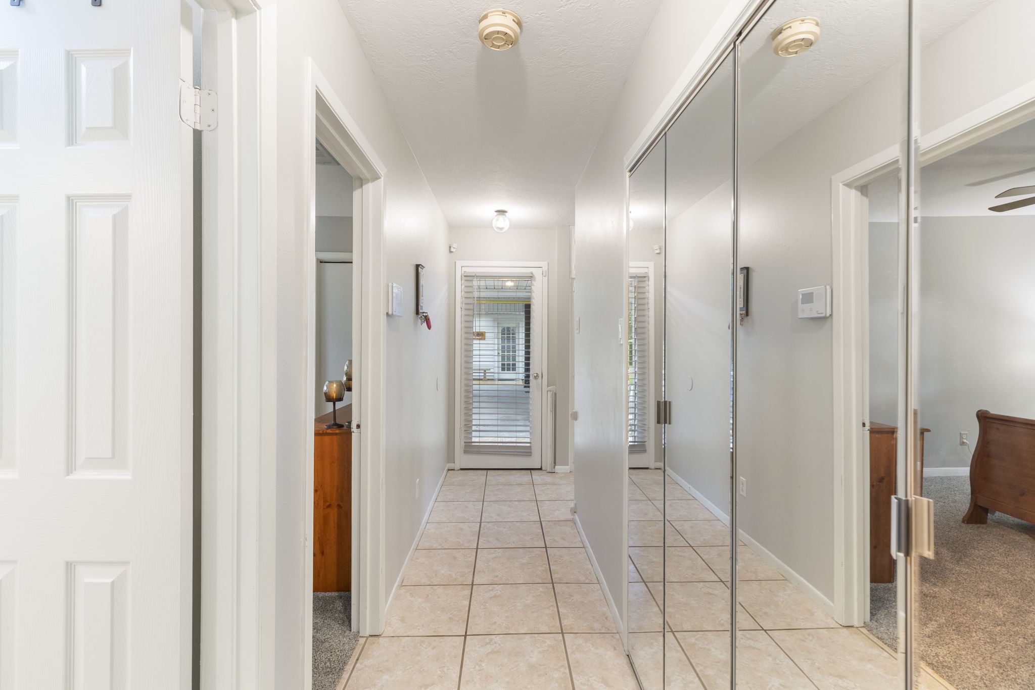 245 Lakeland Road Huntsville, TX 77320 - Photo 31 of 49 Laundry room is located behind the sliding mirrors to the right