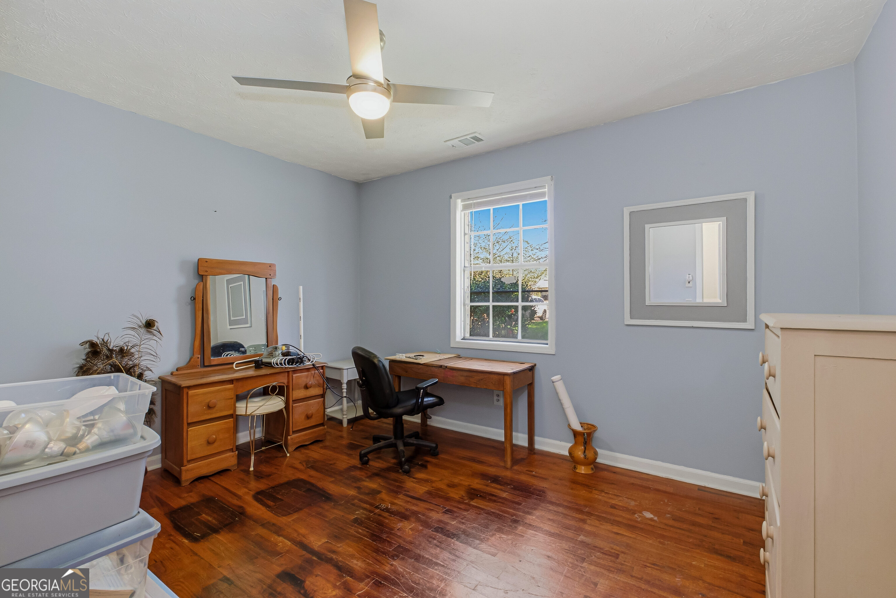4124 Mangum Mill Road Gainesville, GA 30507 - Photo 19 of 48 a work room with furniture and wooden floor