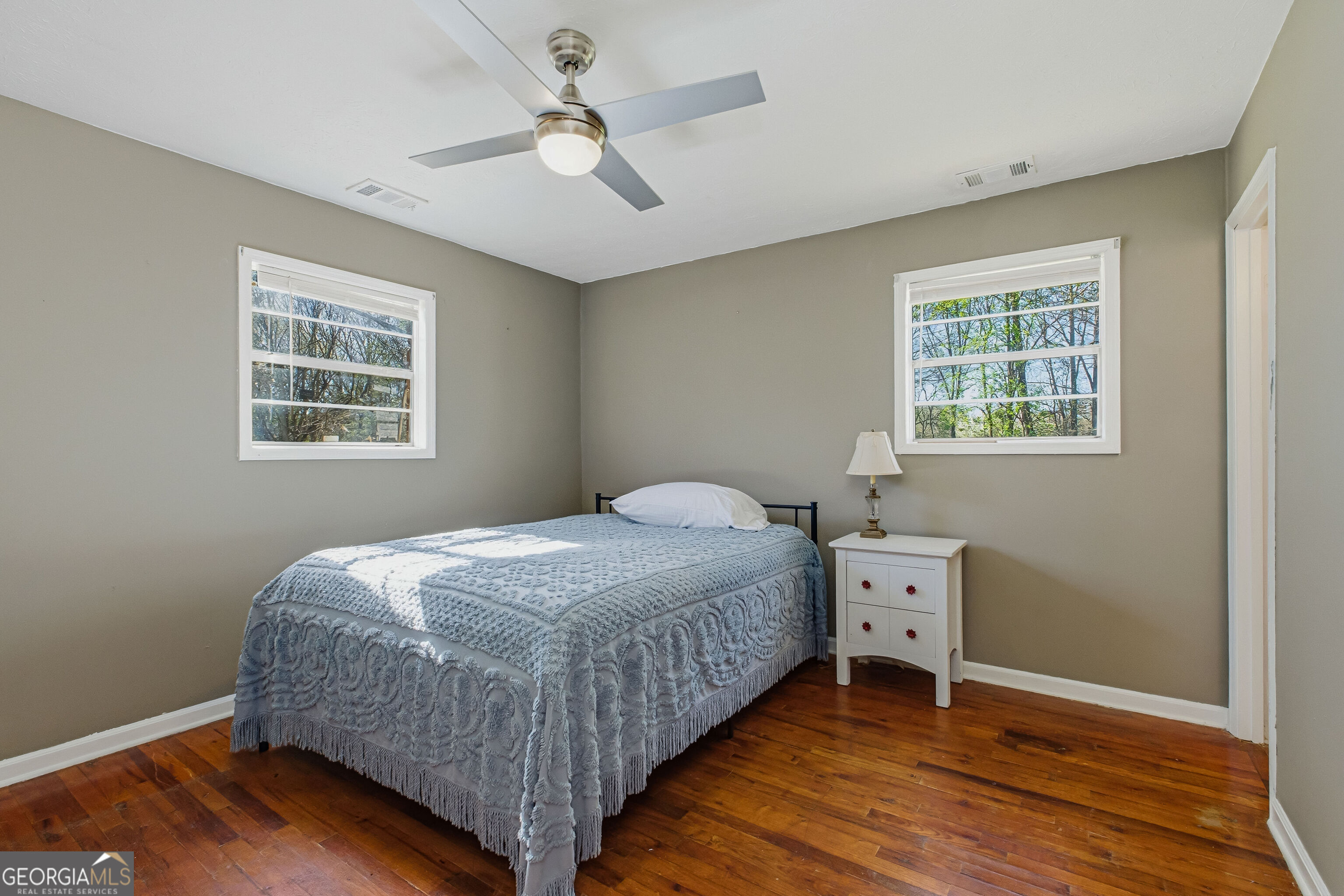 4124 Mangum Mill Road Gainesville, GA 30507 - Photo 24 of 48 a bedroom with a bed dresser and a window